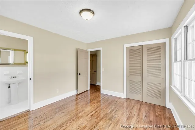 a bathroom with a sink and mirror