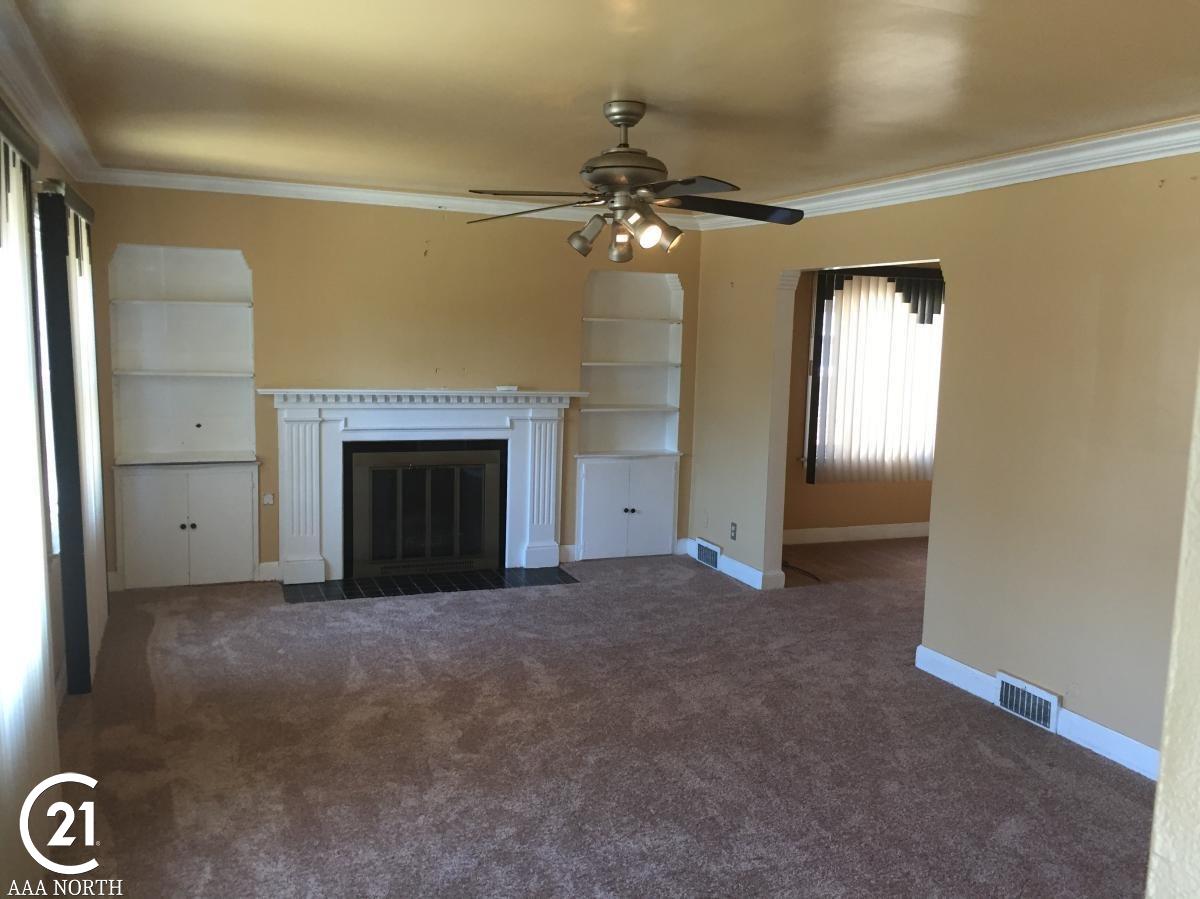 5084 Yorkshire Road Detroit, MI 48224 - Photo 24 of 28 Upper unit living room with fireplace