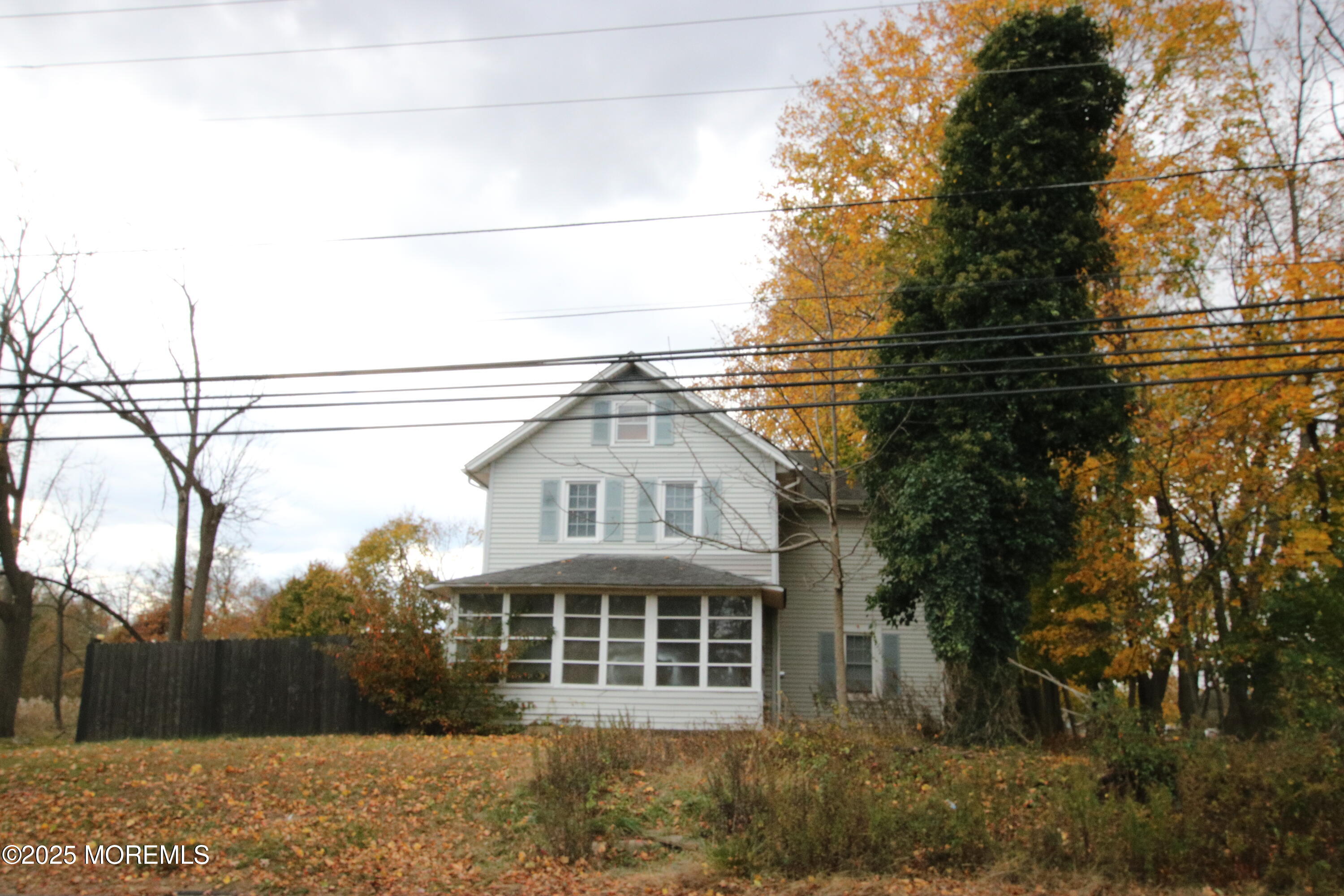 58 Monmouth Road Eatontown, NJ 07724 - Photo 1 of 32 a front view of a house with a yard