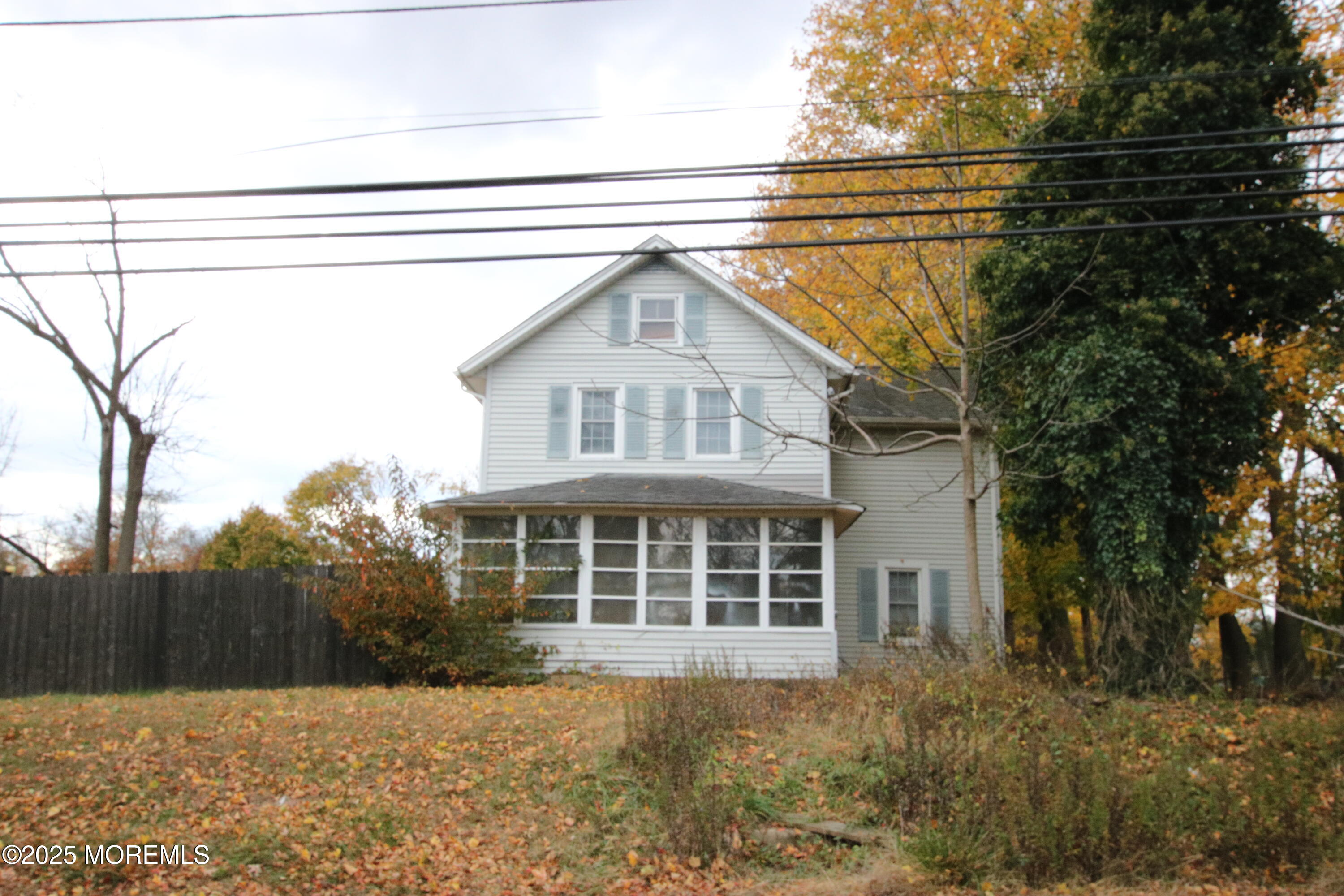 58 Monmouth Road Eatontown, NJ 07724 - Photo 2 of 32 a front view of a house with a yard