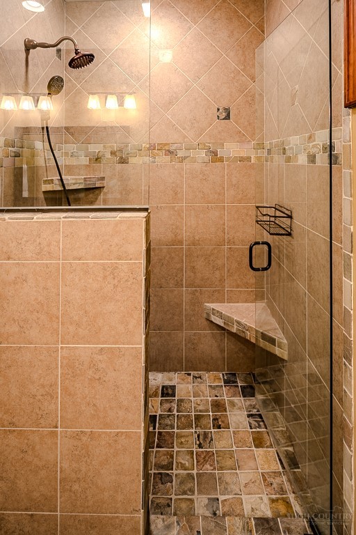 485 Woodlake Loop Road Elk Park, NC 28622 - Photo 17 of 44 a bathroom with a shower