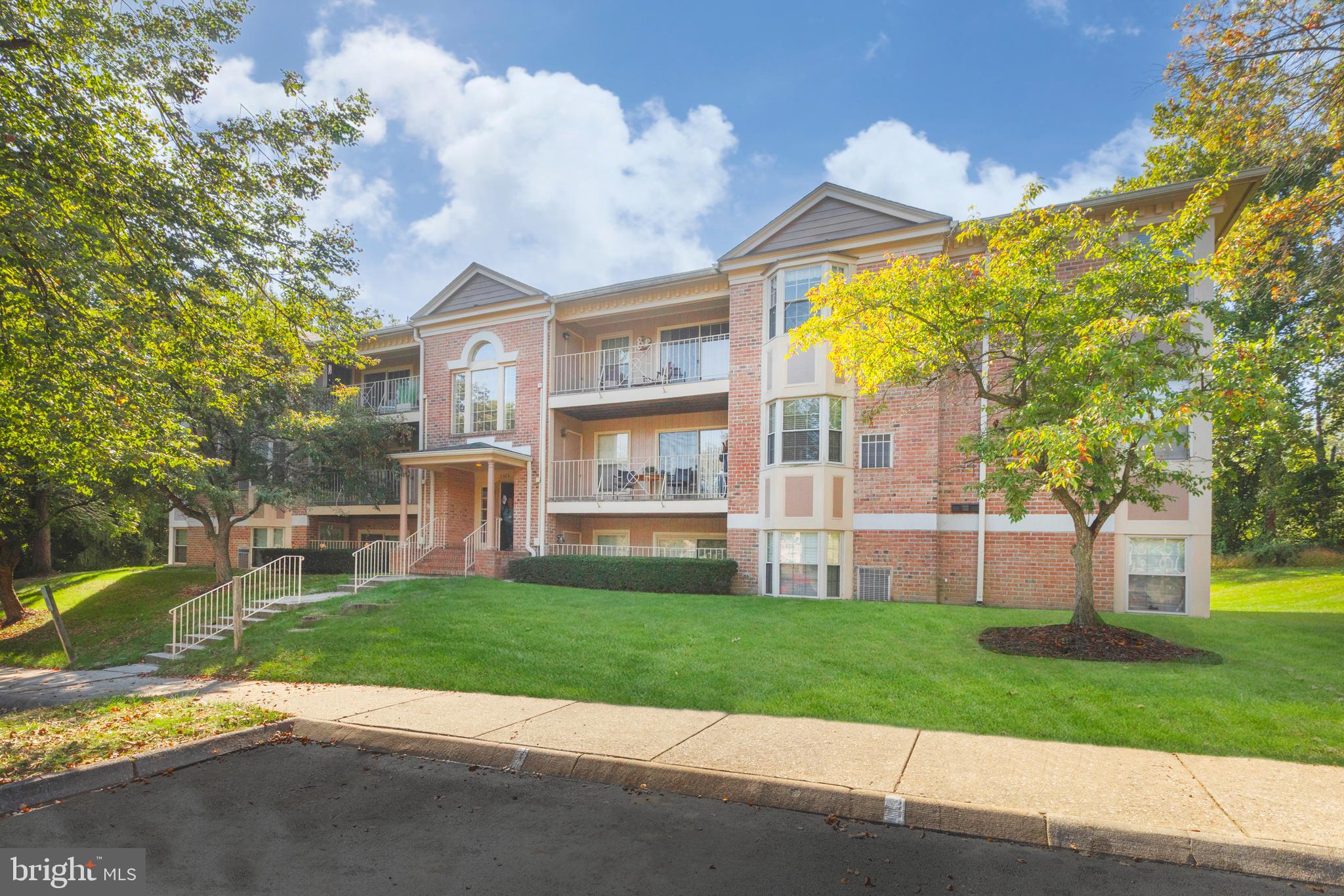 3506 Back Pointe Court, Unit 3D Abingdon, MD 21009 - Photo 1 of 33 a view of a house with a big yard and large tree