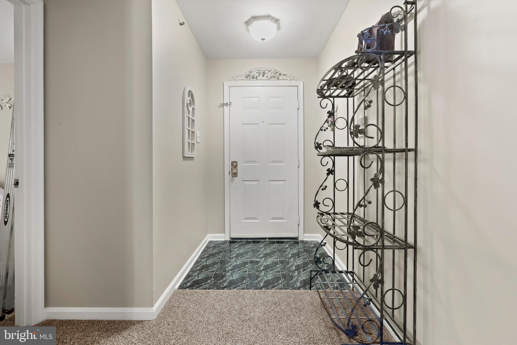 3506 Back Pointe Court, Unit 3D Abingdon, MD 21009 - Photo 2 of 33 a view of walk in closet with wooden floor