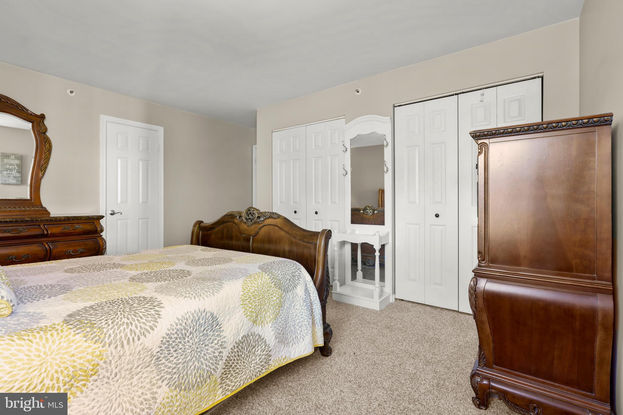 3506 Back Pointe Court, Unit 3D Abingdon, MD 21009 - Photo 26 of 33 a bedroom with a bed and a refrigerator