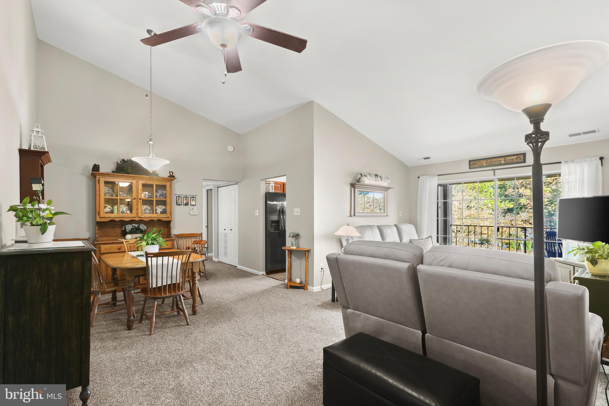 3506 Back Pointe Court, Unit 3D Abingdon, MD 21009 - Photo 4 of 33 a living room with furniture and a large window