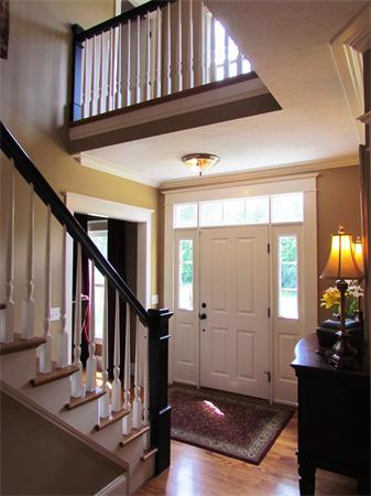 50 Adams Road Grafton, MA 01536 - Photo 16 of 30 a view of entryway and hall with wooden floor