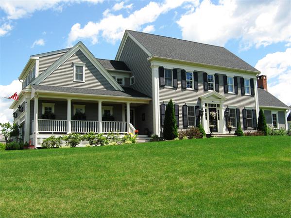 50 Adams Road Grafton, MA 01536 - Photo 2 of 30 a front view of a house with a yard