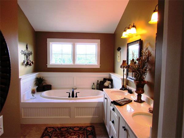 50 Adams Road Grafton, MA 01536 - Photo 23 of 30 a bathroom with a tub sink and mirror