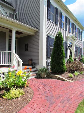 50 Adams Road Grafton, MA 01536 - Photo 26 of 30 a front view of a house with a yard