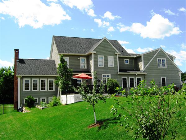 50 Adams Road Grafton, MA 01536 - Photo 28 of 30 a front view of a house with a garden