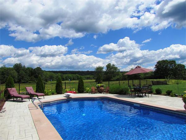 50 Adams Road Grafton, MA 01536 - Photo 4 of 30 a view of swimming pool with seating space