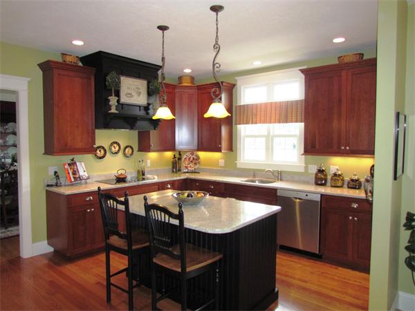 50 Adams Road Grafton, MA 01536 - Photo 5 of 30 a kitchen with a table chairs sink and cabinets