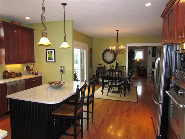 50 Adams Road Grafton, MA 01536 - Photo 6 of 30 a kitchen with a table and chairs in it