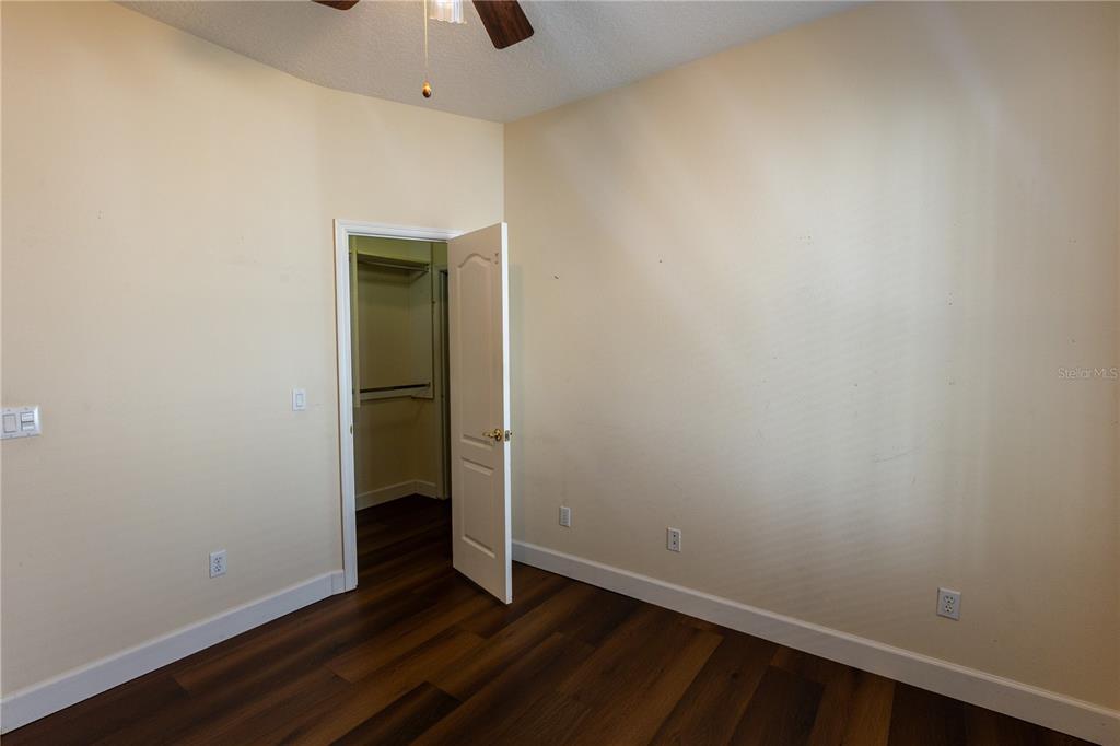 65 Calliope Street Ocoee, FL 34761 - Photo 33 of 60 a view of an empty room with wooden floor