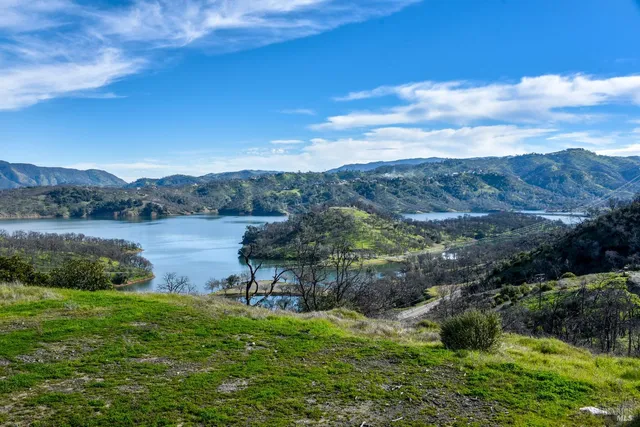 a view of a lake with a mountain in the background