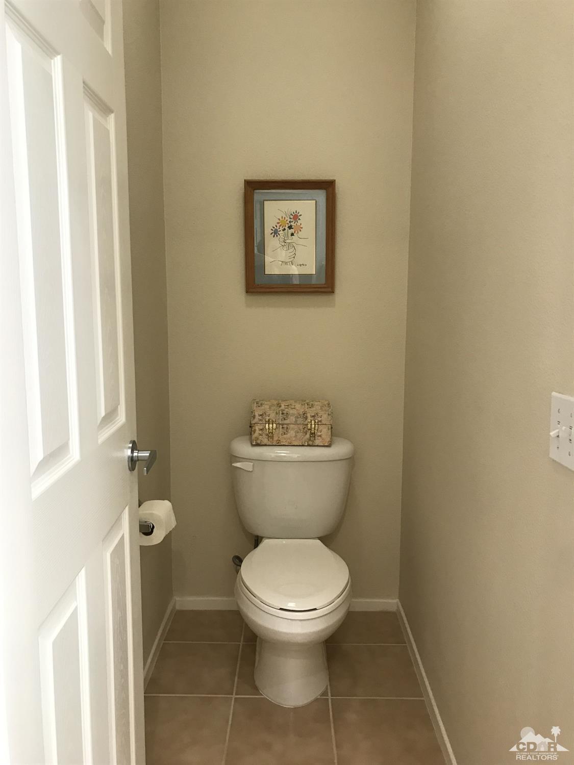 47848 Dancing Butterfly La Quinta, CA 92253 - Photo 18 of 36 a bathroom with a toilet and a shower