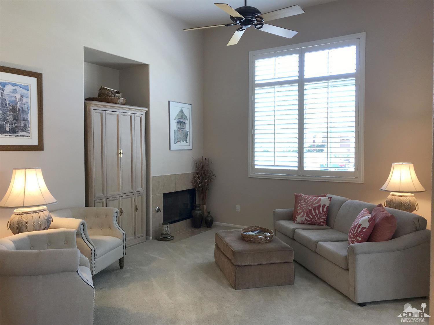 47848 Dancing Butterfly La Quinta, CA 92253 - Photo 3 of 36 a living room with furniture and a window