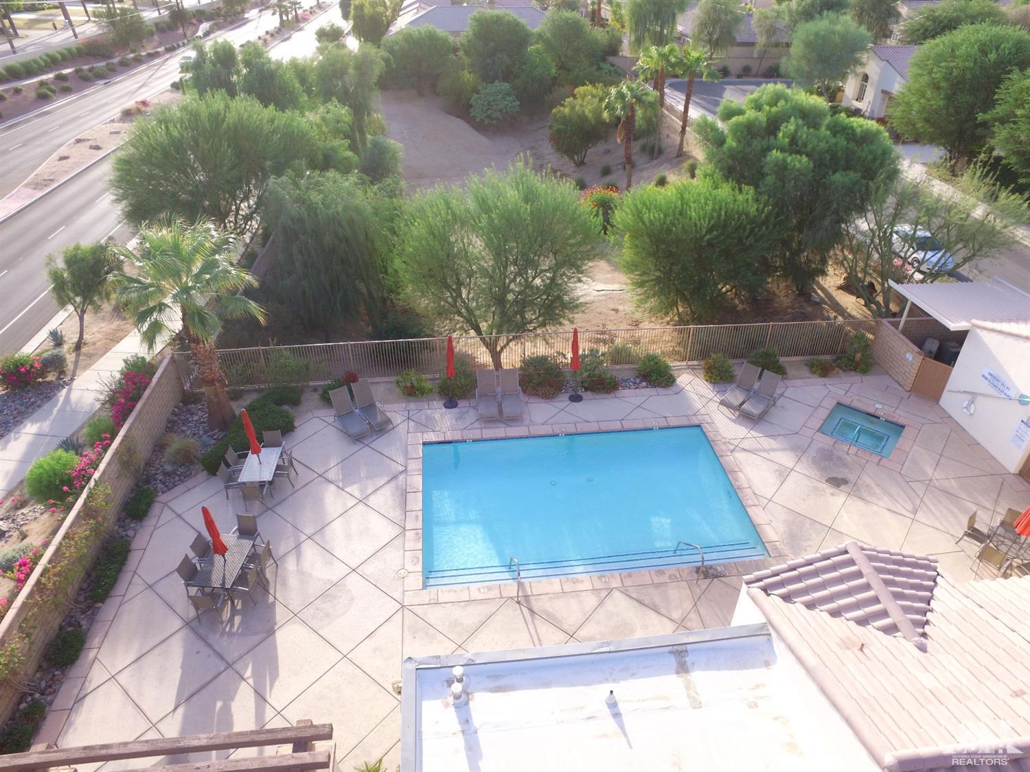 47848 Dancing Butterfly La Quinta, CA 92253 - Photo 30 of 36 a view of outdoor space patio and swimming pool