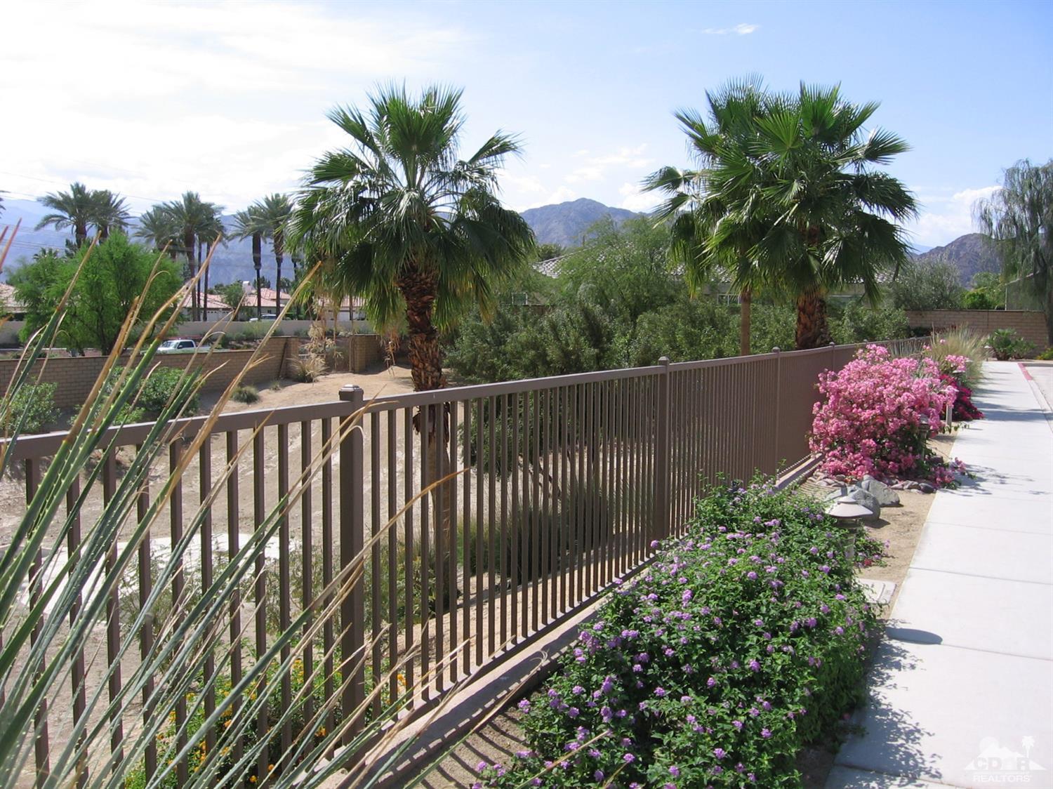 47848 Dancing Butterfly La Quinta, CA 92253 - Photo 33 of 36 a view of a balcony with a potted plants