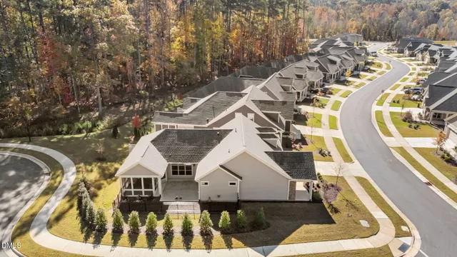 swimming pool view with a seating space