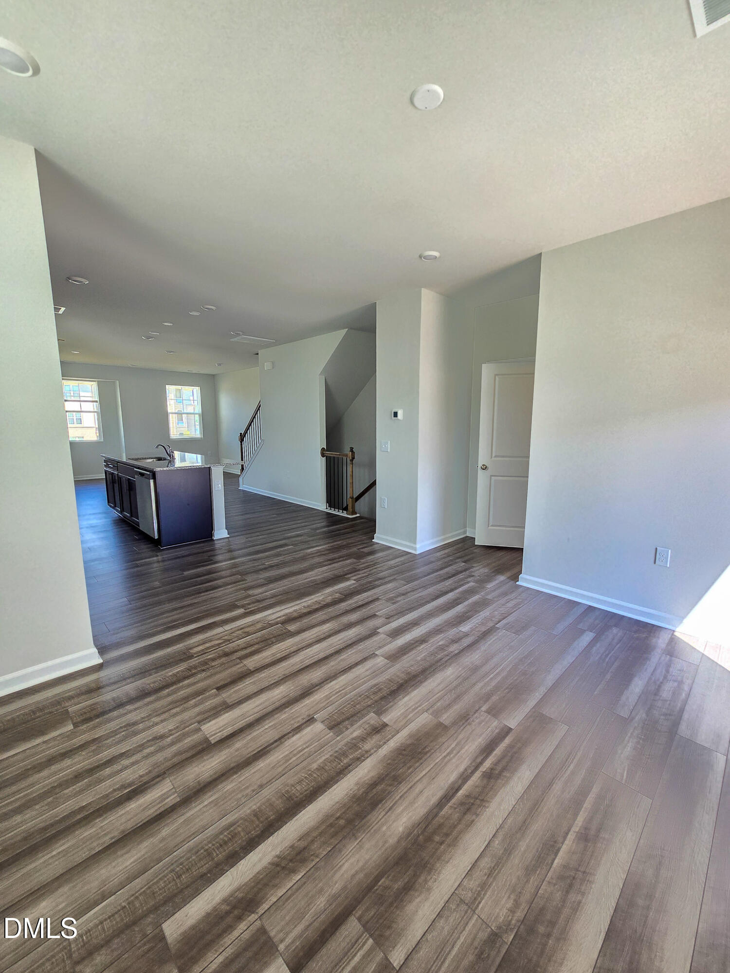 2431 Kasota Lane Raleigh, NC 27610 - Photo 23 of 46 a view of livingroom with furniture and wooden floor