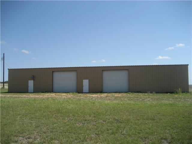 14510 Wells School Road Manor, TX 78653 - Photo 1 of 1 a view of a patio with a yard
