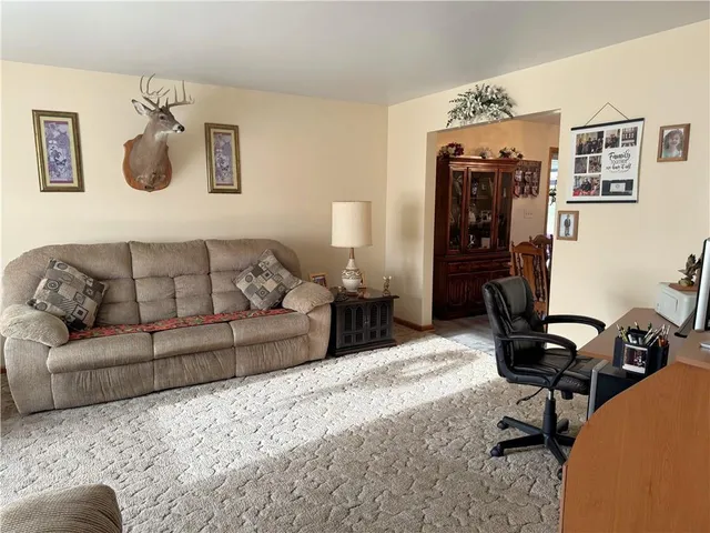 a living room with furniture and a couch