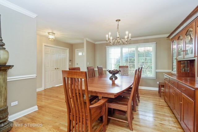 20 Lochbrook Lane Inverness, IL 60010 - Photo 8 of 27 a view of a dining room with furniture window and wooden floor