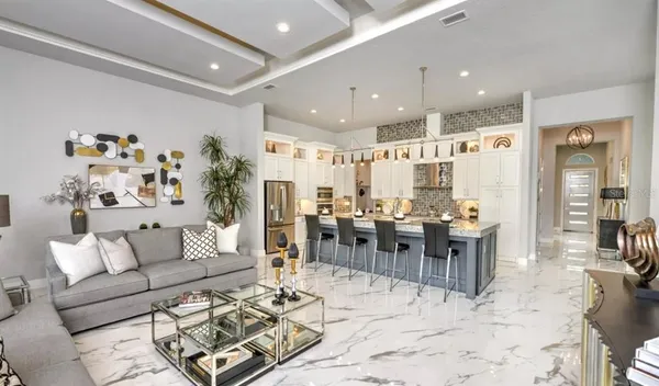 a view of a dining room with furniture and window