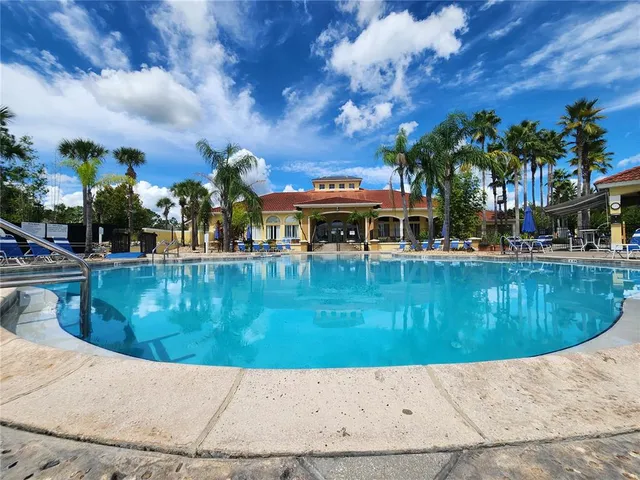 a view of a house with a swimming pool