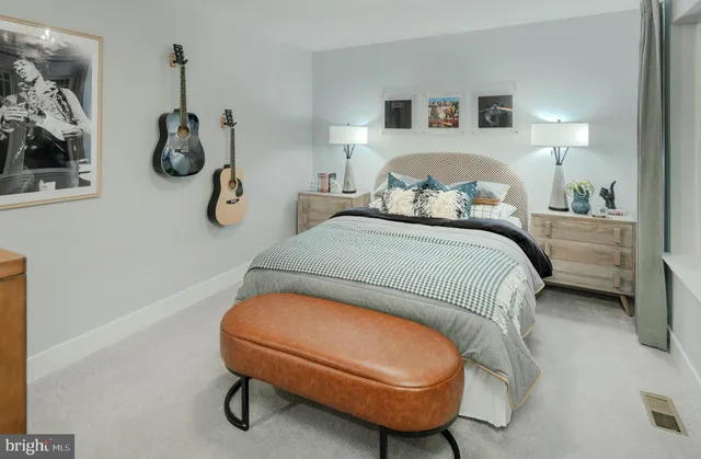 a bedroom with bed and a window