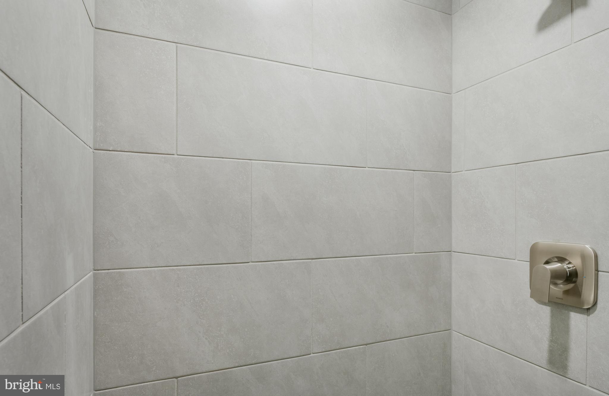 19017 Meadow Sun Way Boyds, MD 20841 - Photo 30 of 34 a bathroom with a shower