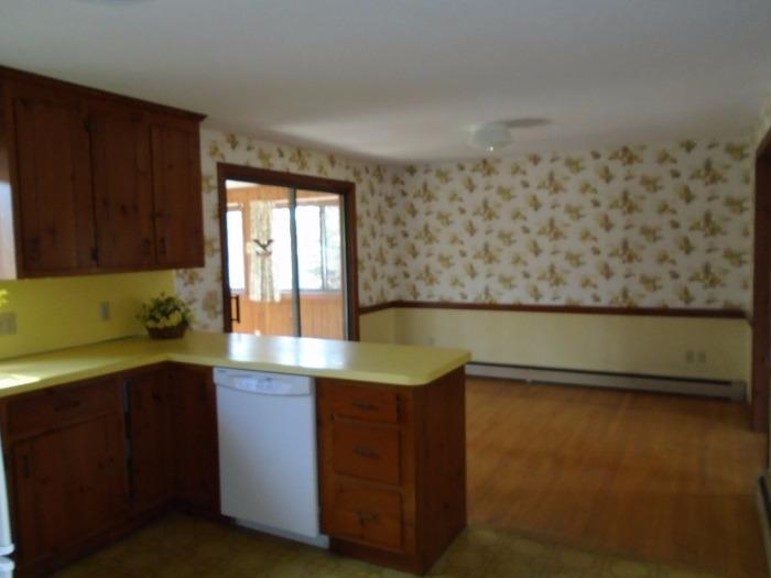 3 Joshua Jethro Road Harwich, MA 02645 - Photo 6 of 19 a kitchen with a sink window and cabinets