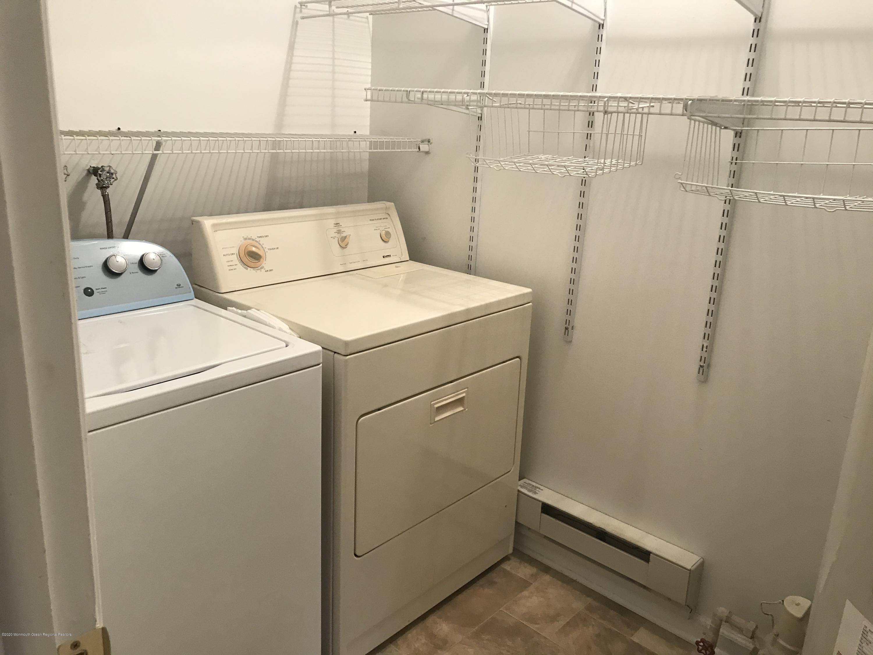 2 Cranberry Road, Unit 10A Manahawkin, NJ 08050 - Photo 18 of 20 a utility room with dryer and washer