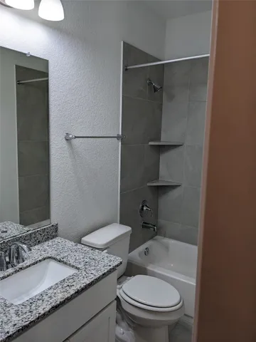 a front view of a house with glass windows