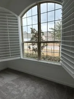 an empty room with a window