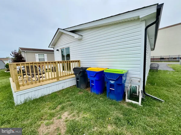 a view of backyard with deck