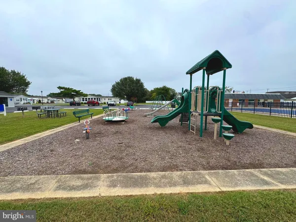a view of a park with swings