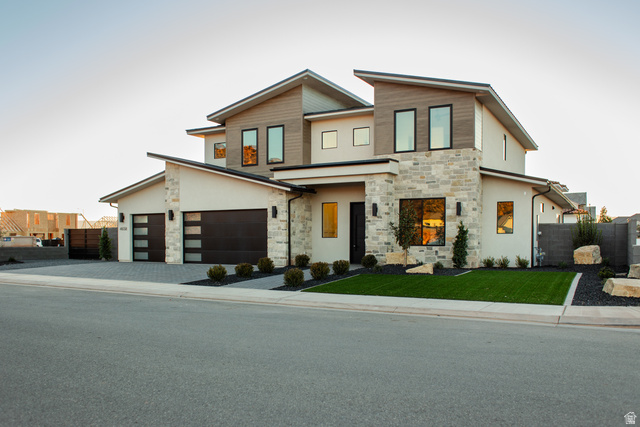 4658 South 380 East Washington, UT 84780 - Photo 1 of 10 Contemporary home with stone siding, stucco siding, and driveway