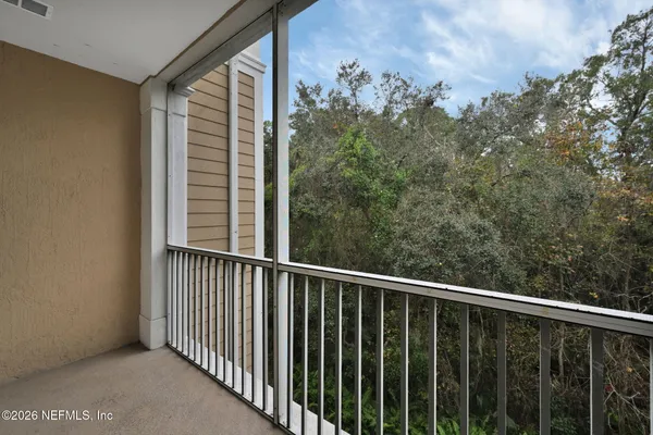 a view of a balcony with outside space