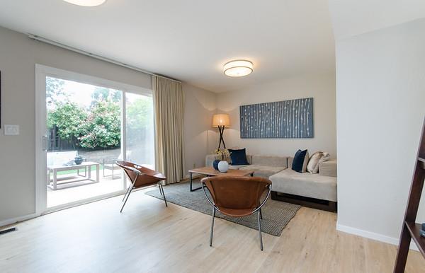 849 Allardice Way Stanford, CA 94305 - Photo 11 of 28 a living room with furniture and a large window