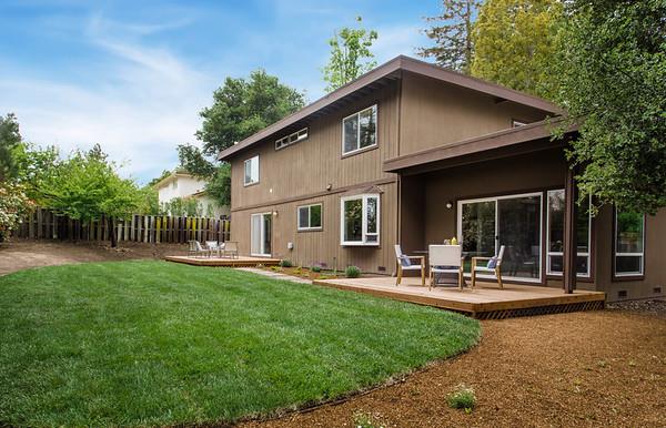 849 Allardice Way Stanford, CA 94305 - Photo 14 of 28 a view of a chair and table in backyard of the house