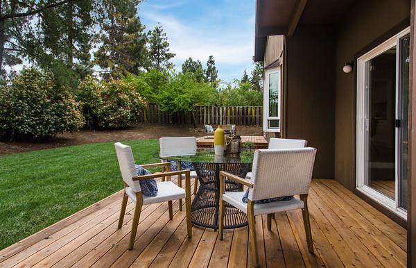 849 Allardice Way Stanford, CA 94305 - Photo 15 of 28 a view of a patio with table and chairs and wooden floor