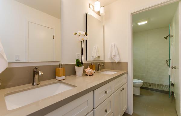 849 Allardice Way Stanford, CA 94305 - Photo 18 of 28 a bathroom with a double vanity sink toilet and a mirror