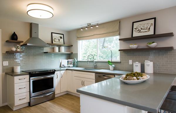 849 Allardice Way Stanford, CA 94305 - Photo 9 of 28 a kitchen with stainless steel appliances a stove a sink and cabinets