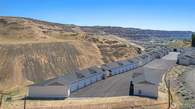 a view of a house with a street