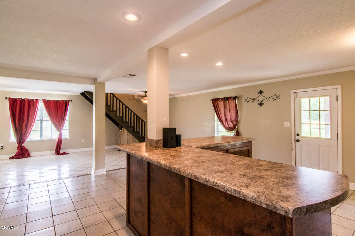21470 Simoneaux Lane Saucier, MS 39574 - Photo 8 of 40 Dining room & family room 1.2