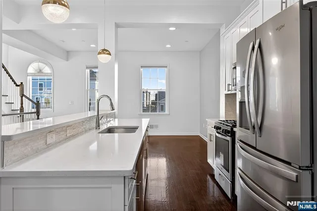 a view of a bathroom with wooden floor