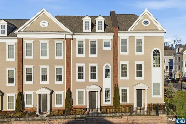 a bathroom with a sink toilet and a mirror