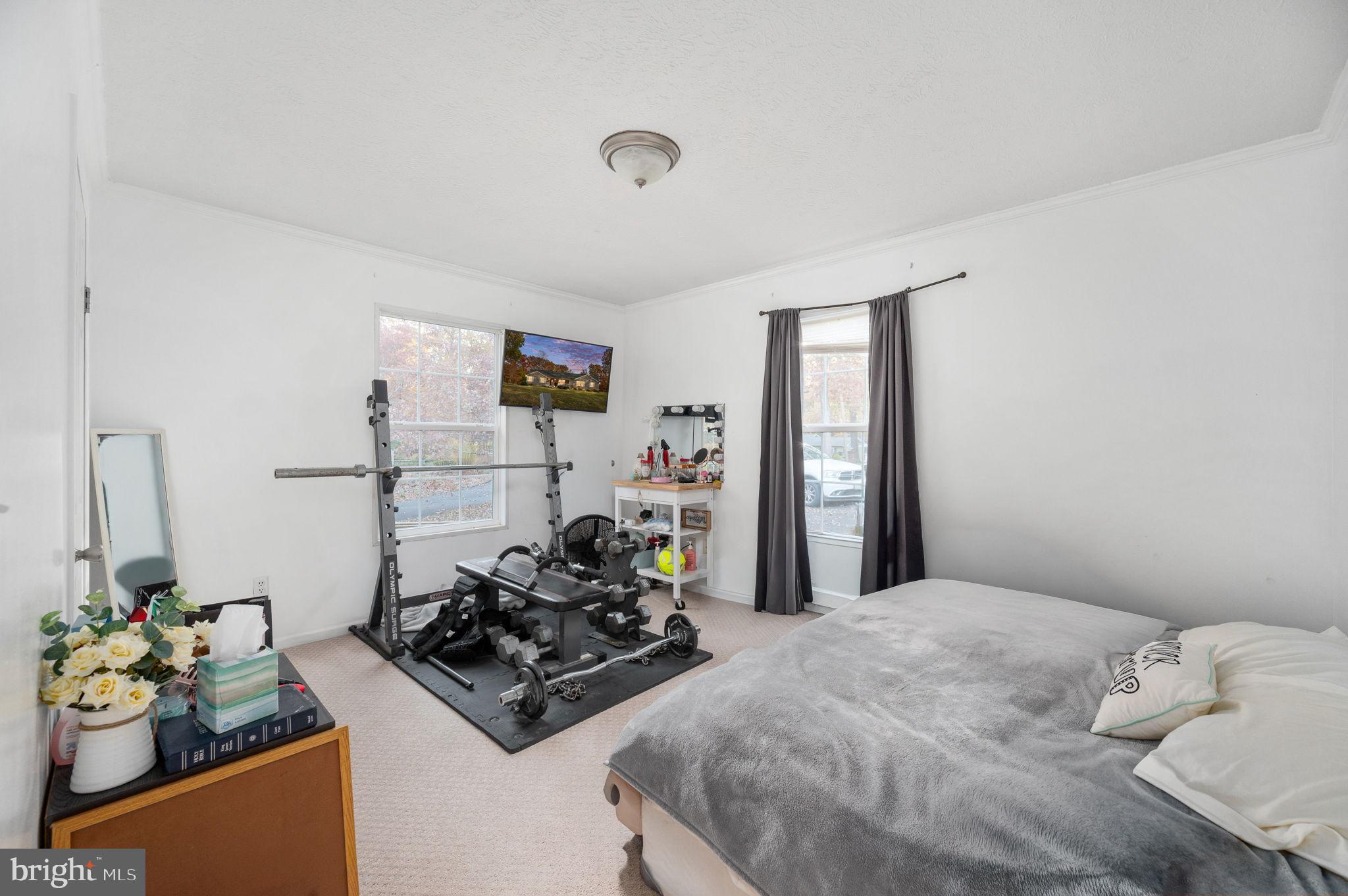 10325 Mill Pond Road Spotsylvania, VA 22551 - Photo 19 of 43 a living room with furniture and a window